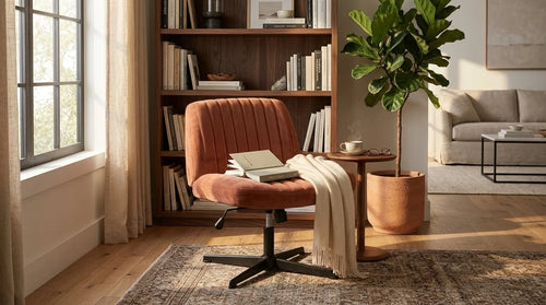 Terracotta_velvet_swivel_criss_cross_chair_styled_in_a_warm_living_room_corner